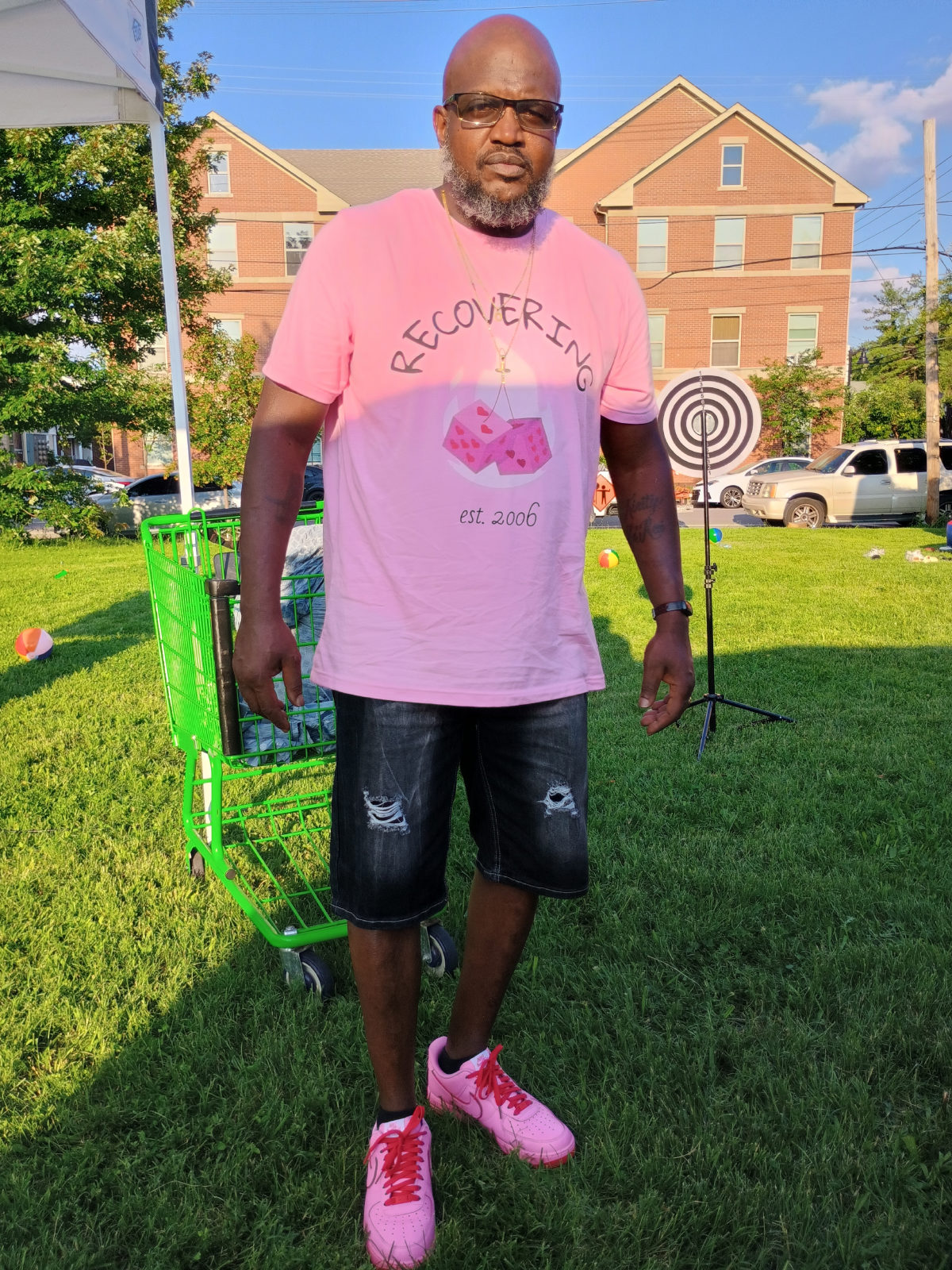 Ontario wearing a pink VV-Styles tee reading &ldquo;Recovering, est. 2006&rdquo;